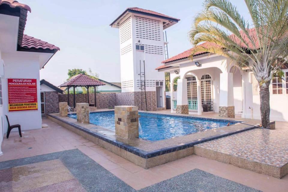 קוטה בארו Wan Danisha Villa Inn מראה חיצוני תמונה