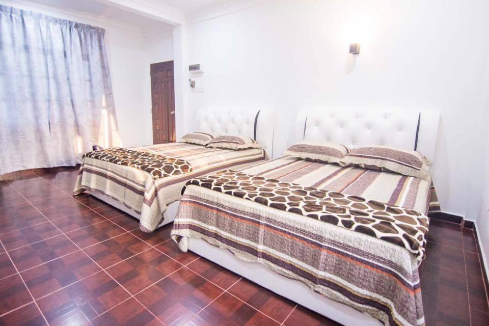 קוטה בארו Wan Danisha Villa Inn מראה חיצוני תמונה